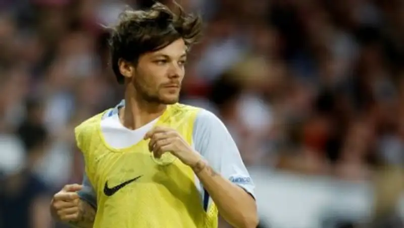 Участника бойз-бэнда One Direction арестовали после стычки с папарацци