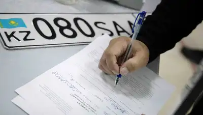 поправки в Налоговый кодекс по госномерам, фото - Новости Zakon.kz от 25.03.2022 12:37