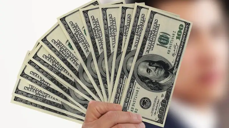 Доллар подешевел на торгах 12 декабря