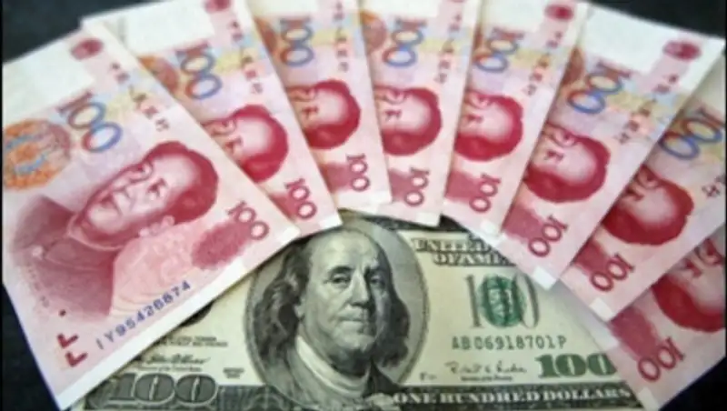 ЦБ Китая понизил курс юаня к минимуму за 4,5 года до 6,48 за доллар США