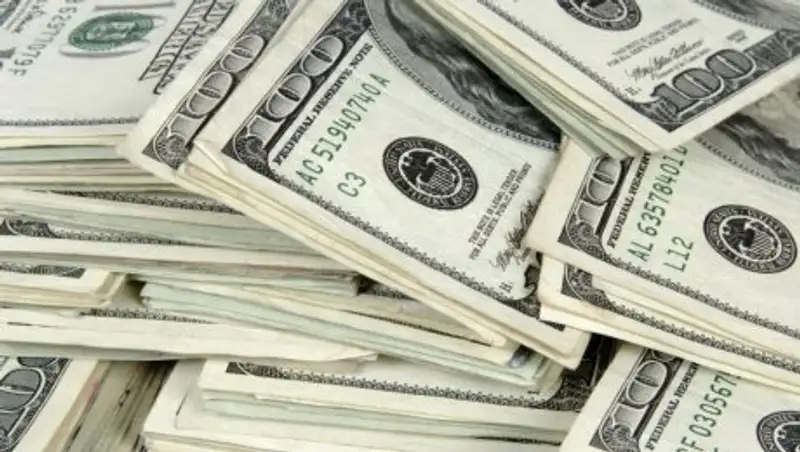 Доллар на утренних торгах подешевел до 320 тенге