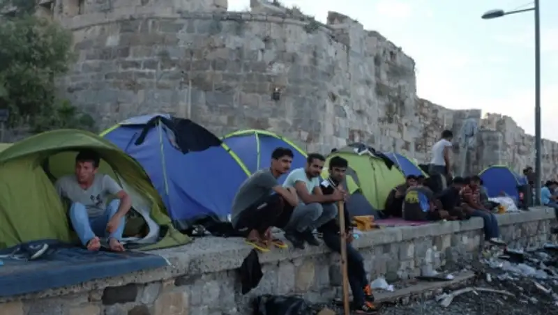 Кэмерон и Меркель призвали к быстрой высылке нелегальных мигрантов