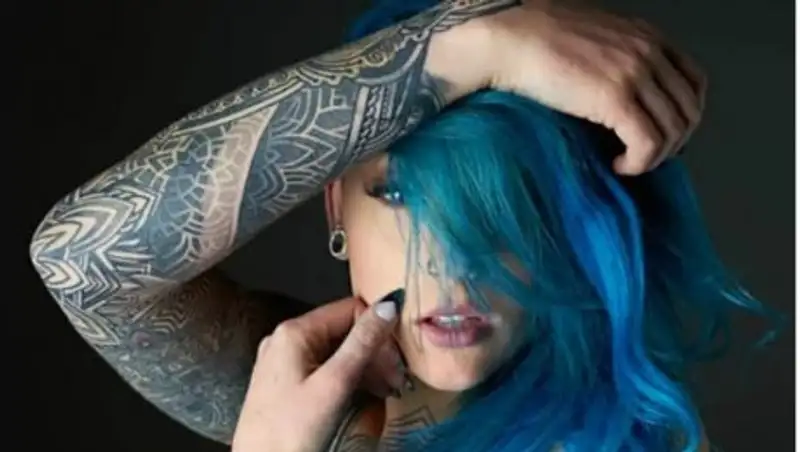 Австралийка потратила $16.000 на татуировки