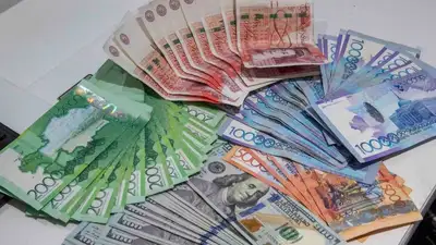 тенге, доллары, обменники, фото - Новости Zakon.kz от 11.05.2023 11:15