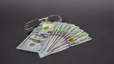 АФМ: Фальшивые доллары сбывали в Астане и Костанайской области