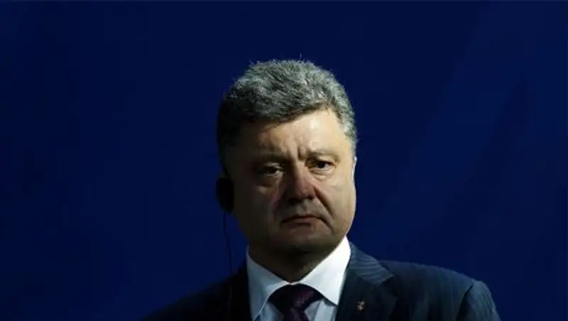 Порошенко заявил Меркель о готовности к двустороннему прекращению огня
