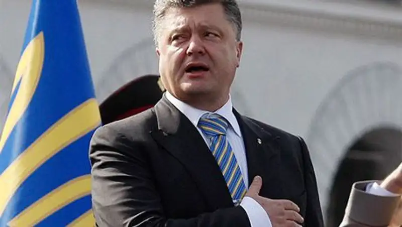 Порошенко изменился в лице при виде Путина