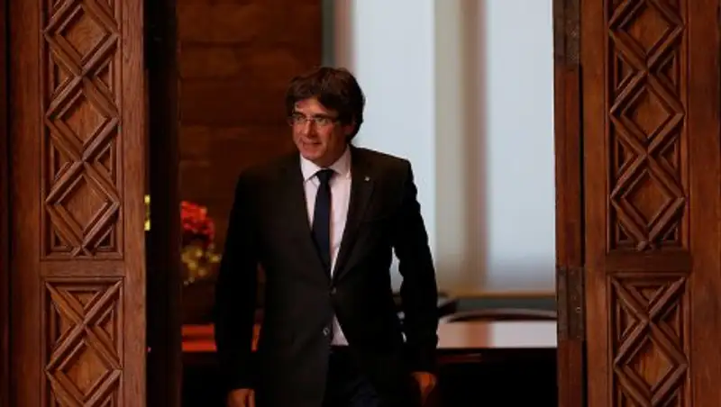 Экс-главу Каталонии освободил суд на определенных условиях