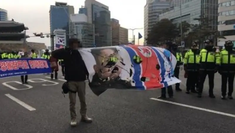 В Сеуле протестуют против приезда делегации КНДР на Олимпиаду
