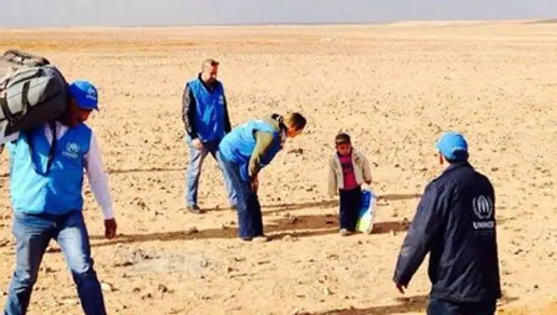 «Потерявшиеся» родители сирийского беженца нашлись за кадром фотографии в Twitter