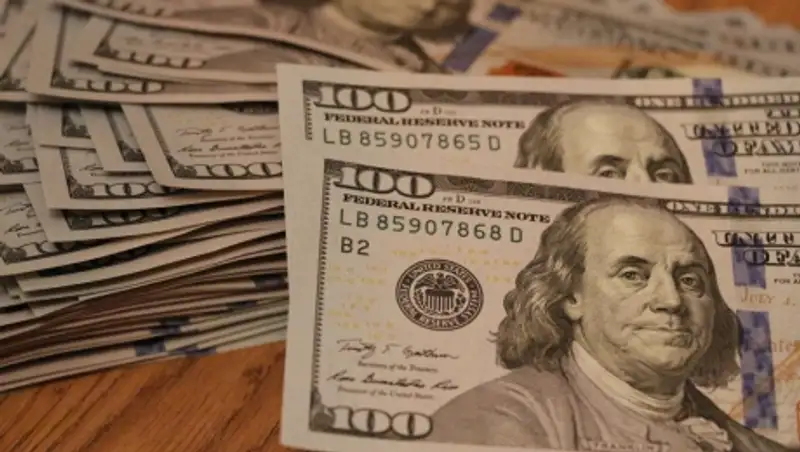 Курс доллара плавно снижается