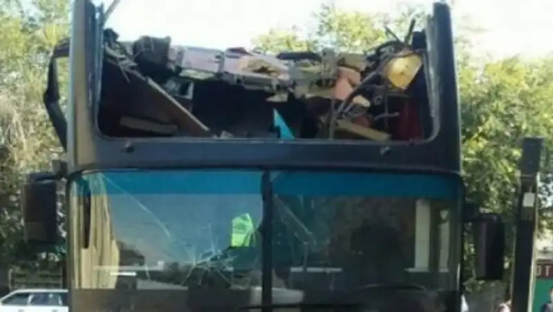 В Семее автобус застрял под мостом