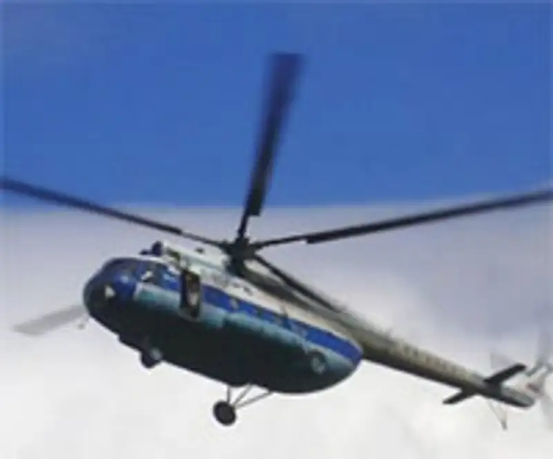 Спасатели обследуют дно озера Алаколь в поисках пропавшего три дня назад вертолета, фото - Новости Zakon.kz от 27.11.2012 19:15