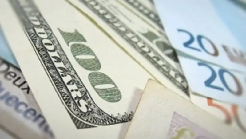 Тенге укрепился до 319 за доллар