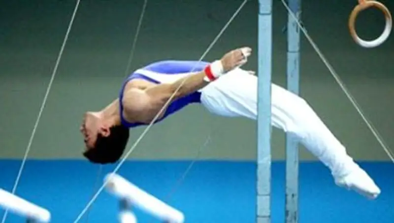 Главный тренер казахстанской школы гимнастики судит турнир в Баку