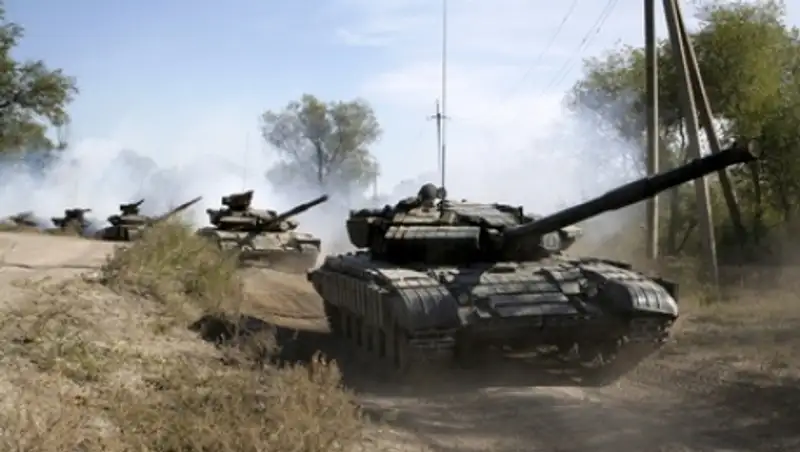 Украинские военные начали отвод вооружений в Донбассе