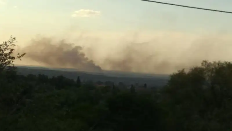 Очаги тления на мусорном полигоне в Алматы засыпают грунтом