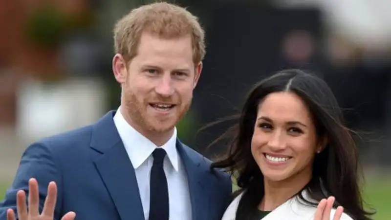 На новой монете в £5 изображены принц Гарри и Меган Маркл