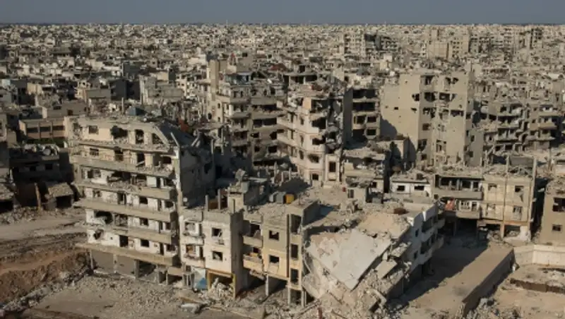 Сирийские повстанцы оставляют город Хомс