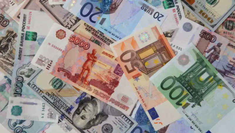 Валюты многих развивающихся стран ослабли к доллару