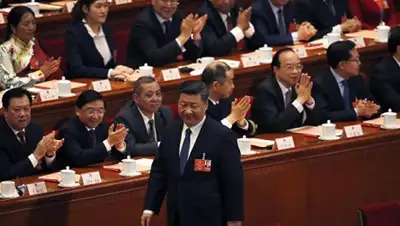 © AP Photo / Andy Wong, фото - Новости Zakon.kz от 11.03.2018 15:35