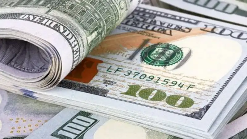 Доллар продолжил рост на дневных торгах