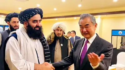 представитель Афганистана и министр МИД Китая, фото - Новости Zakon.kz от 06.10.2023 11:55