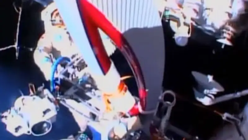 Экипаж «Союз ТМА-09М» вернул олимпийский факел на Землю