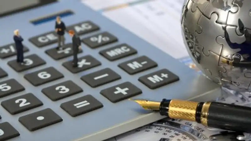 Алматинцам напомнили о налоговых долгах