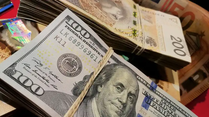 Курс доллара вырос на торгах 12 июня