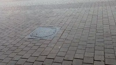 Люк канализации, фото - Новости Zakon.kz от 20.07.2022 16:01