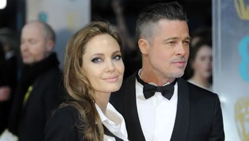 Анджелина Джоли на вечеринке приревновала Брэда Питта к темнокожей сопернице