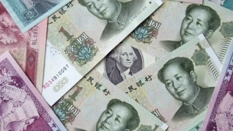 МВФ: Китай может прийти к плавающему курсу юаня через два-три года