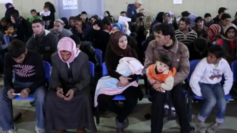 После атак в Париже 22 штата США отказались принять беженцев из Сирии