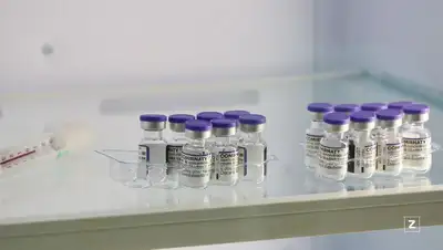 вакцинация оплата , фото - Новости Zakon.kz от 05.12.2021 14:50