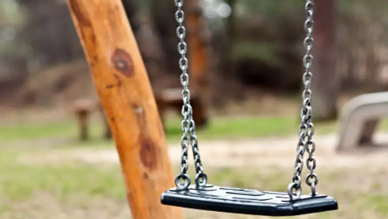 В Павлодаре двое детей сорвались вместе с качелями