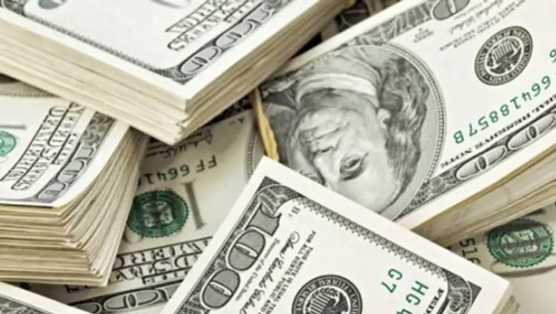 Доллар завершает неделю новым ростом