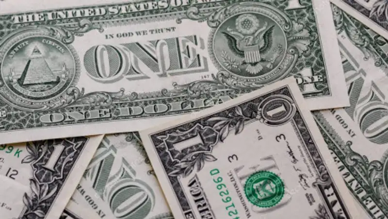 Доллар прибавил почти 2 тенге на торгах