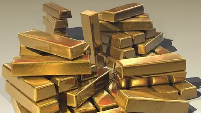 цена золота дешевеет, фото - Новости Zakon.kz от 18.05.2022 14:01
