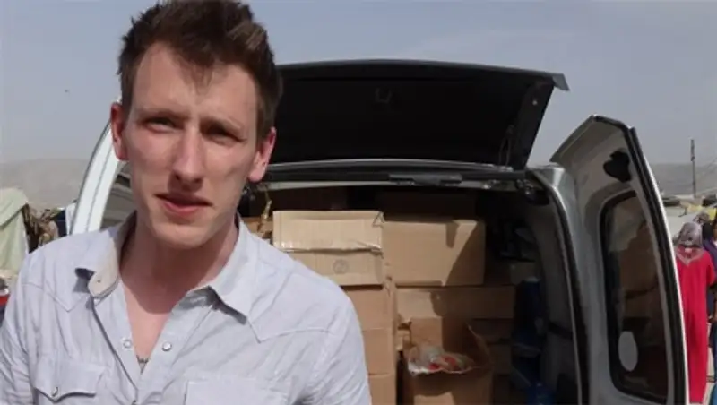 СМИ: "Исламское государство" распространило видео с казнью американца Питера Кэссига