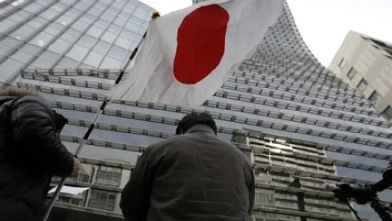 Япония считает преждевременным снятие санкций с России