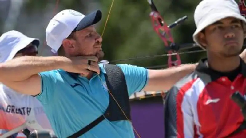 Олимпиада-2020: Казахстанский лучник победил в первом круге турнира