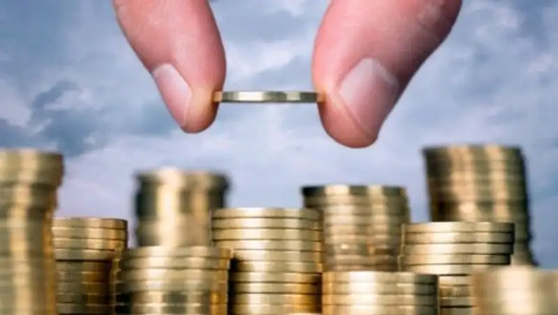 Трехлетний бюджет принят с новыми курсом тенге к доллару и ценой на нефть