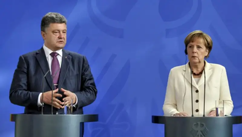 Порошенко и Меркель обсудили пути урегулирования ситуации в Донбассе