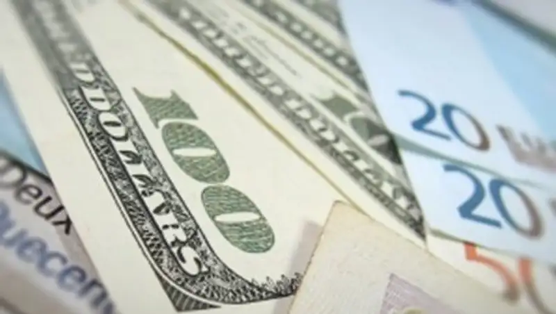 Тенге укрепился до 320,53 за доллар