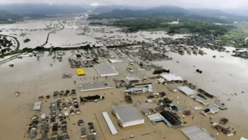 Число жертв от наводнения в Японии растет