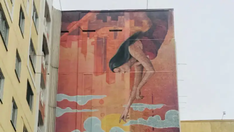 Пострадавший от ремонта мурал восстановили в Алматы