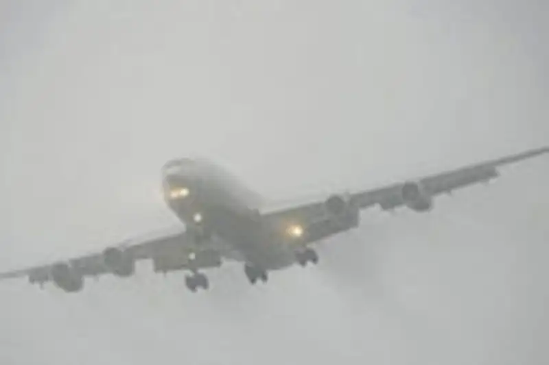 В связи с туманом в Алматы задерживаются рейсы, фото - Новости Zakon.kz от 02.12.2011 15:23