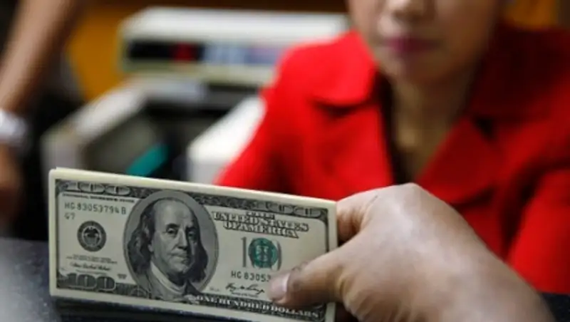 Каким будет курс тенге к доллару в конце сентября