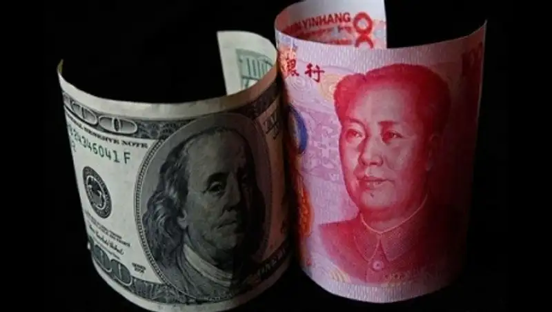 Юань может заменить доллар в международных расчетах Казахстана
